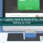 WordPress expert working on a website with a laptop and coding books
